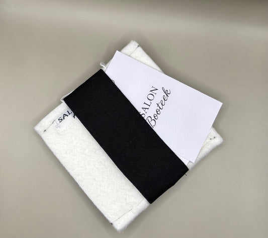 Plush pressing pad with light tan pad and black strap, thick design for everyday hair pressing, suitable for fine to thick hair textures.