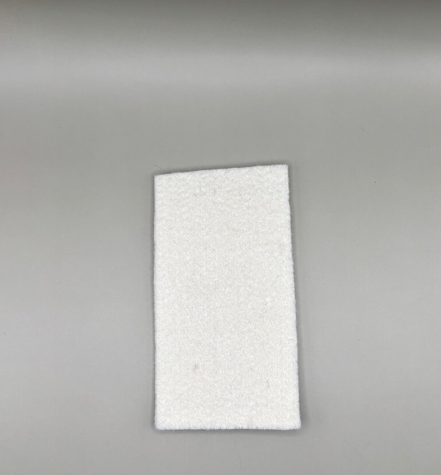 Heat-resistant felt polyester liner insert designed to fit inside plush pressing pads for added support and heat control.